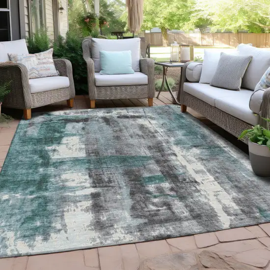 Teal Blue And Ivory Abstract Washable Indoor Outdoor Area Rug Photo 4
