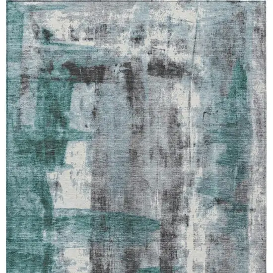 Teal Blue And Ivory Abstract Washable Indoor Outdoor Area Rug Photo 1