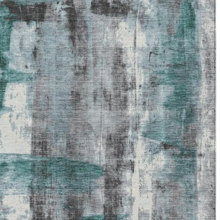 Teal Blue And Ivory Abstract Washable Indoor Outdoor Area Rug Photo 1