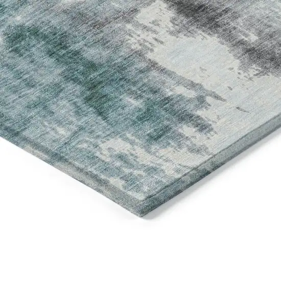 Teal Blue And Ivory Abstract Washable Indoor Outdoor Area Rug Photo 9