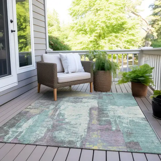 Teal Blue And Ivory Abstract Washable Indoor Outdoor Area Rug Photo 8