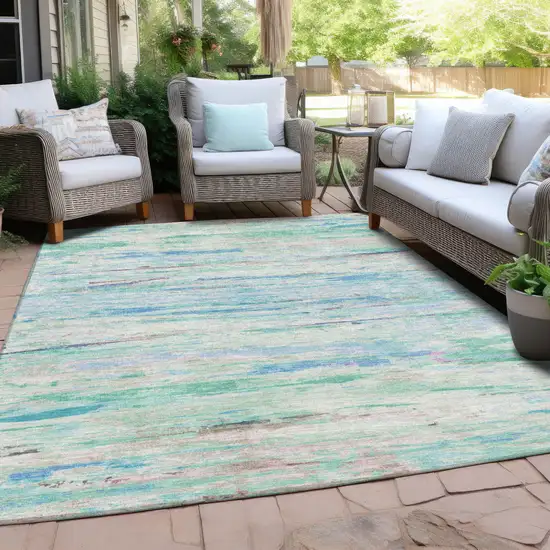 Teal Blue And Ivory Abstract Washable Indoor Outdoor Area Rug Photo 4