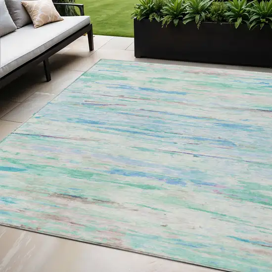 Teal Blue And Ivory Abstract Washable Indoor Outdoor Area Rug Photo 2