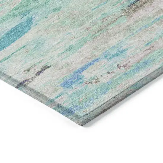 Teal Blue And Ivory Abstract Washable Indoor Outdoor Area Rug Photo 9