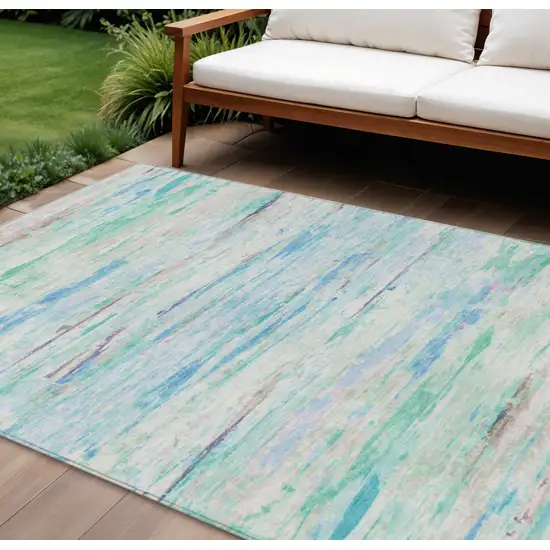 Teal Blue And Ivory Abstract Washable Indoor Outdoor Area Rug Photo 2