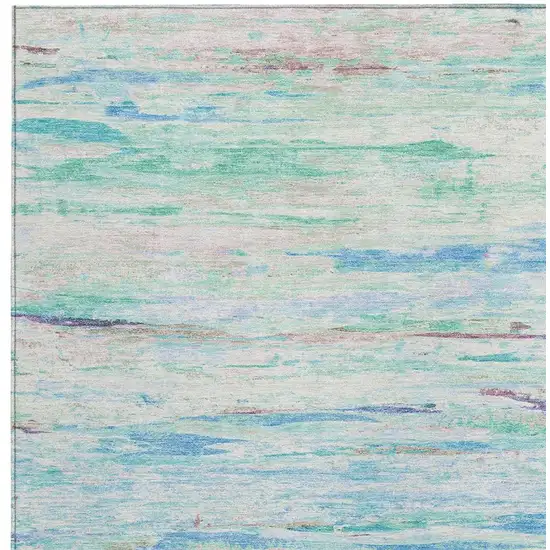 Teal Blue And Ivory Abstract Washable Indoor Outdoor Area Rug Photo 3