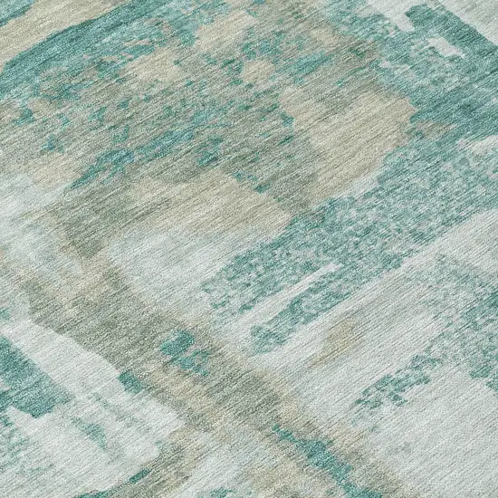 Teal Blue And Ivory Abstract Washable Indoor Outdoor Area Rug Photo 1