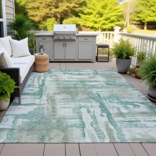 Teal Blue And Ivory Abstract Washable Indoor Outdoor Area Rug Photo 6