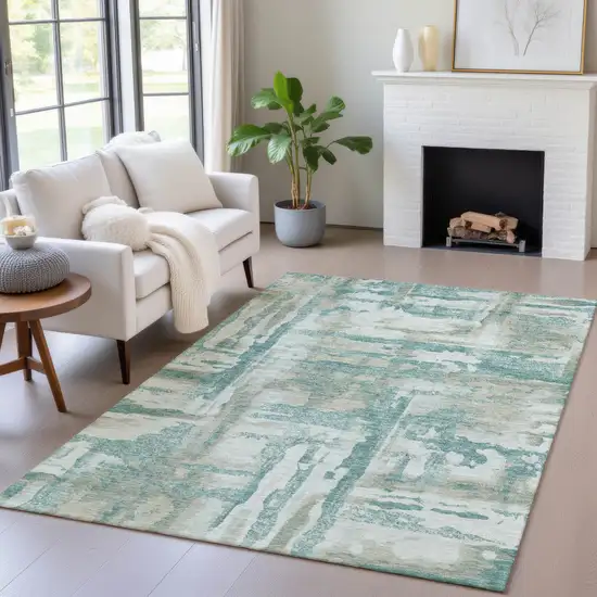 Teal Blue And Ivory Abstract Washable Indoor Outdoor Area Rug Photo 3