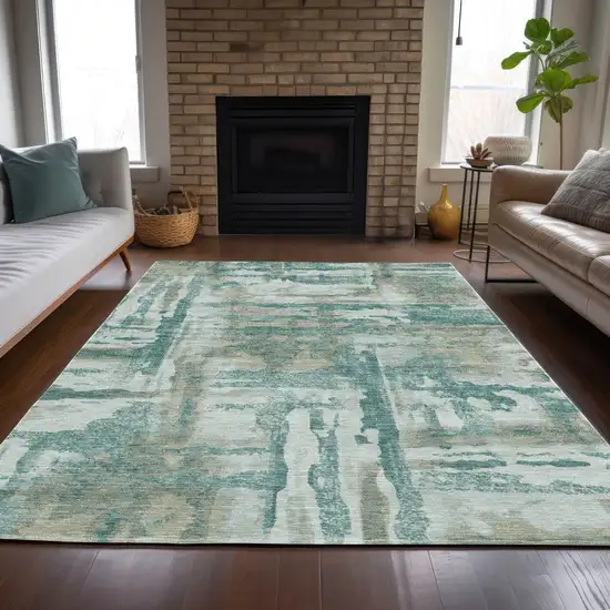 Teal Blue And Ivory Abstract Washable Indoor Outdoor Area Rug Photo 4