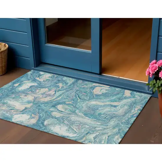 Teal Blue And Ivory Abstract Washable Indoor Outdoor Area Rug Photo 2