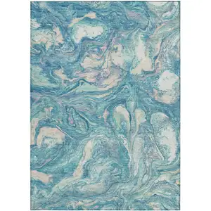 Photo of Teal Blue And Ivory Abstract Washable Indoor Outdoor Area Rug