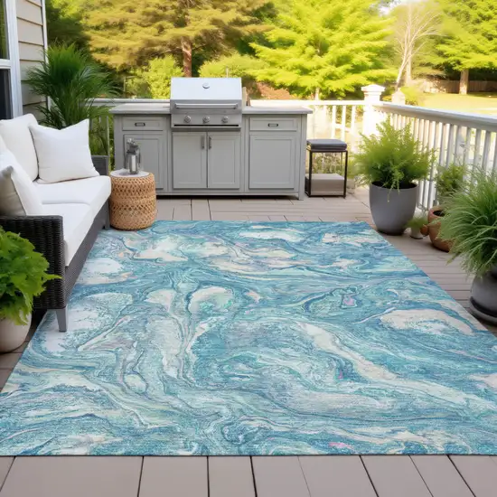 Teal Blue And Ivory Abstract Washable Indoor Outdoor Area Rug Photo 4