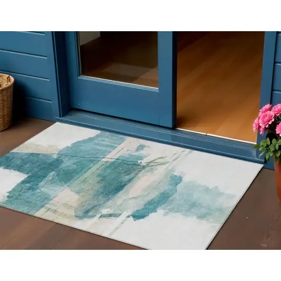 Teal Blue And Ivory Abstract Washable Indoor Outdoor Area Rug Photo 2