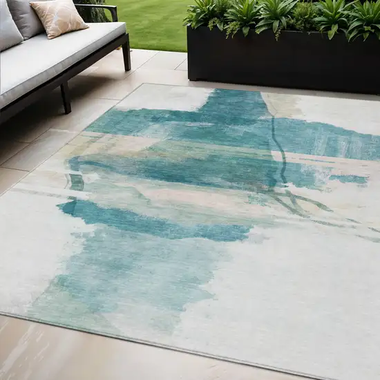 Teal Blue And Ivory Abstract Washable Indoor Outdoor Area Rug Photo 2
