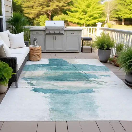 Teal Blue And Ivory Abstract Washable Indoor Outdoor Area Rug Photo 5