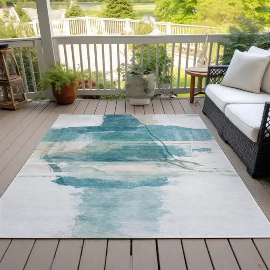 Teal Blue And Ivory Abstract Washable Indoor Outdoor Area Rug Photo 8