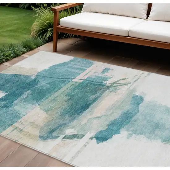 Teal Blue And Ivory Abstract Washable Indoor Outdoor Area Rug Photo 2