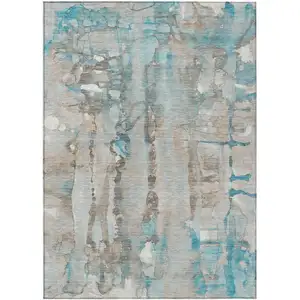 Photo of Teal Blue And Ivory Abstract Washable Indoor Outdoor Area Rug