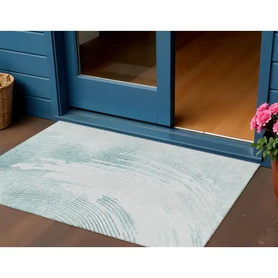 Teal Blue And Ivory Abstract Washable Indoor Outdoor Area Rug Photo 2