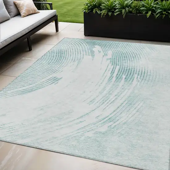 Teal Blue And Ivory Abstract Washable Indoor Outdoor Area Rug Photo 2