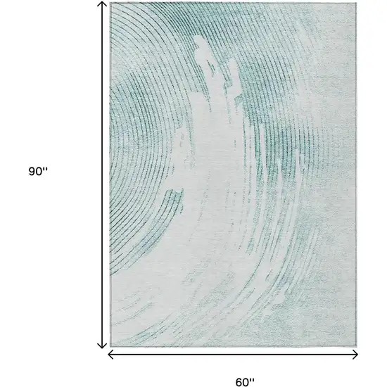 Teal Blue And Ivory Abstract Washable Indoor Outdoor Area Rug Photo 9