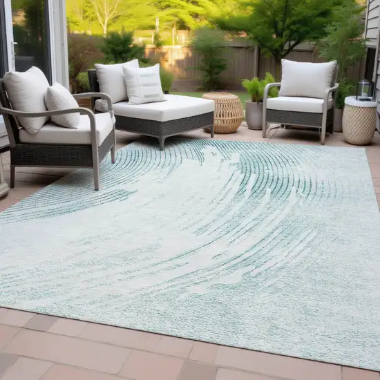 Teal Blue And Ivory Abstract Washable Indoor Outdoor Area Rug Photo 8