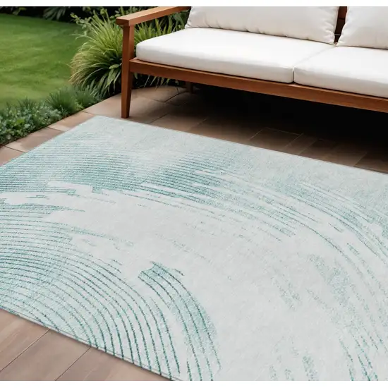 Teal Blue And Ivory Abstract Washable Indoor Outdoor Area Rug Photo 2