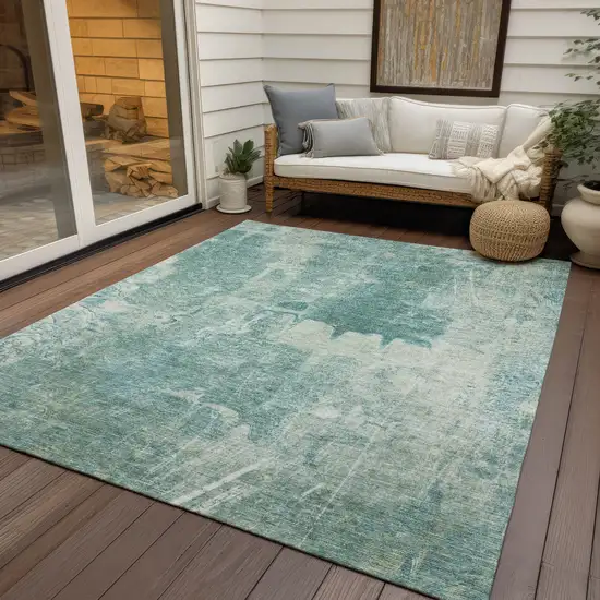 Teal Blue And Ivory Abstract Washable Indoor Outdoor Area Rug Photo 9