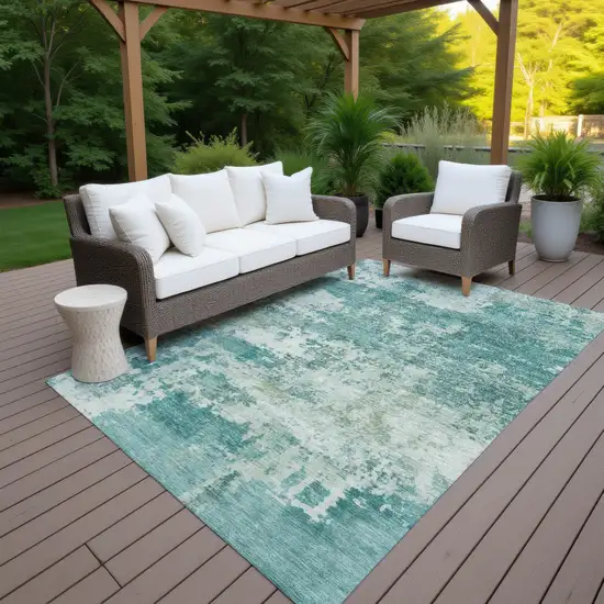 Teal Blue And Ivory Abstract Washable Indoor Outdoor Area Rug Photo 6