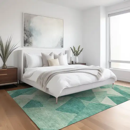 Teal Blue And Ivory Abstract Washable Indoor Outdoor Area Rug Photo 6