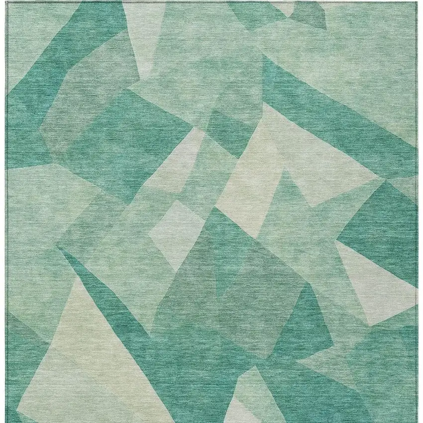 Teal Blue And Ivory Abstract Washable Indoor Outdoor Area Rug Photo 3