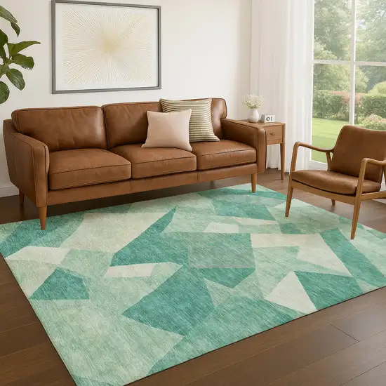 Teal Blue And Ivory Abstract Washable Indoor Outdoor Area Rug Photo 5