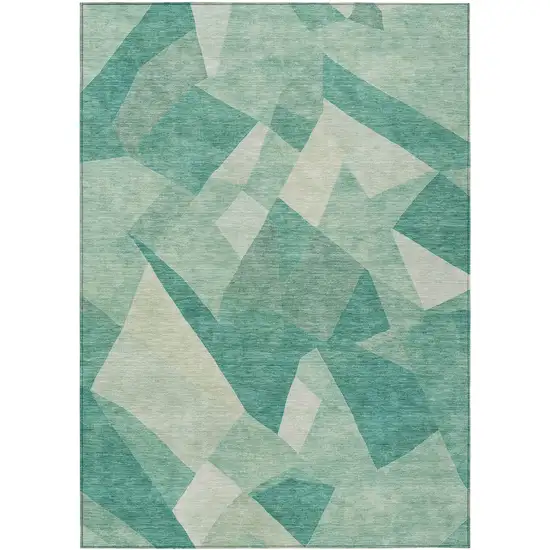 Teal Blue And Ivory Abstract Washable Indoor Outdoor Area Rug Photo 1