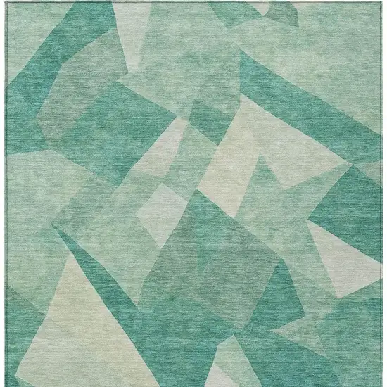 Teal Blue And Ivory Abstract Washable Indoor Outdoor Area Rug Photo 3