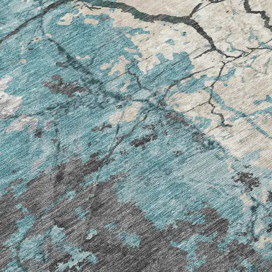 Teal Blue And Ivory Abstract Washable Indoor Outdoor Area Rug Photo 9