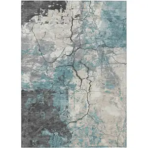 Photo of Teal Blue And Ivory Abstract Washable Indoor Outdoor Area Rug