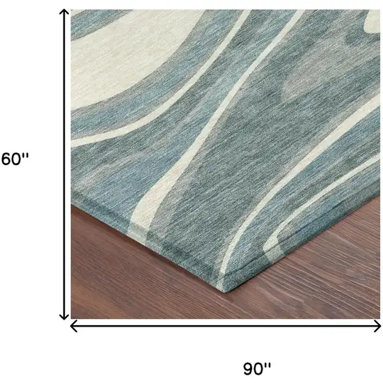 Teal Blue And Ivory Abstract Washable Indoor Outdoor Area Rug Photo 7