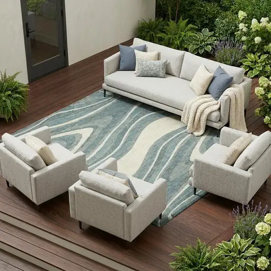Teal Blue And Ivory Abstract Washable Indoor Outdoor Area Rug Photo 1