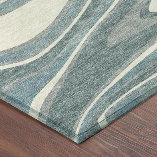 Teal Blue And Ivory Abstract Washable Indoor Outdoor Area Rug Photo 4