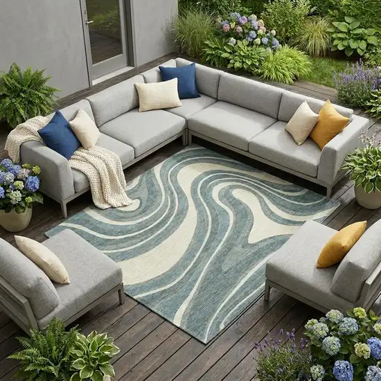 Teal Blue And Ivory Abstract Washable Indoor Outdoor Area Rug Photo 1