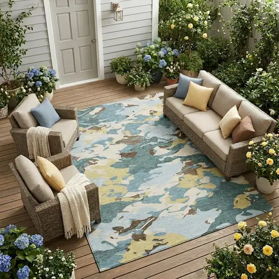 Teal Blue And Ivory Abstract Washable Indoor Outdoor Area Rug Photo 1