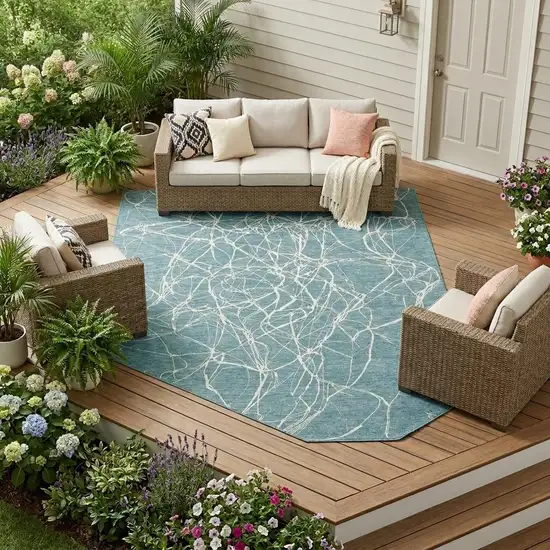 Teal Blue And Ivory Abstract Washable Indoor Outdoor Area Rug Photo 1