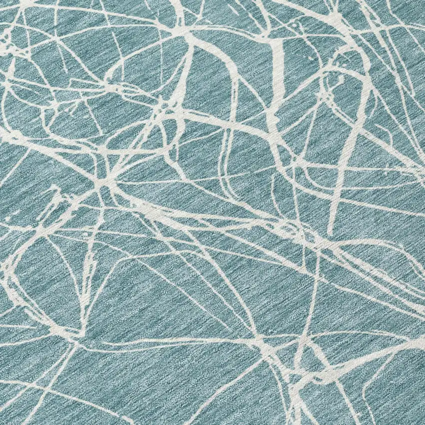 Teal Blue And Ivory Abstract Washable Indoor Outdoor Area Rug Photo 4