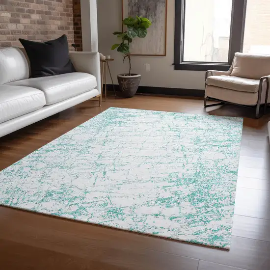 Teal Blue And Ivory Abstract Washable Indoor Outdoor Area Rug Photo 7