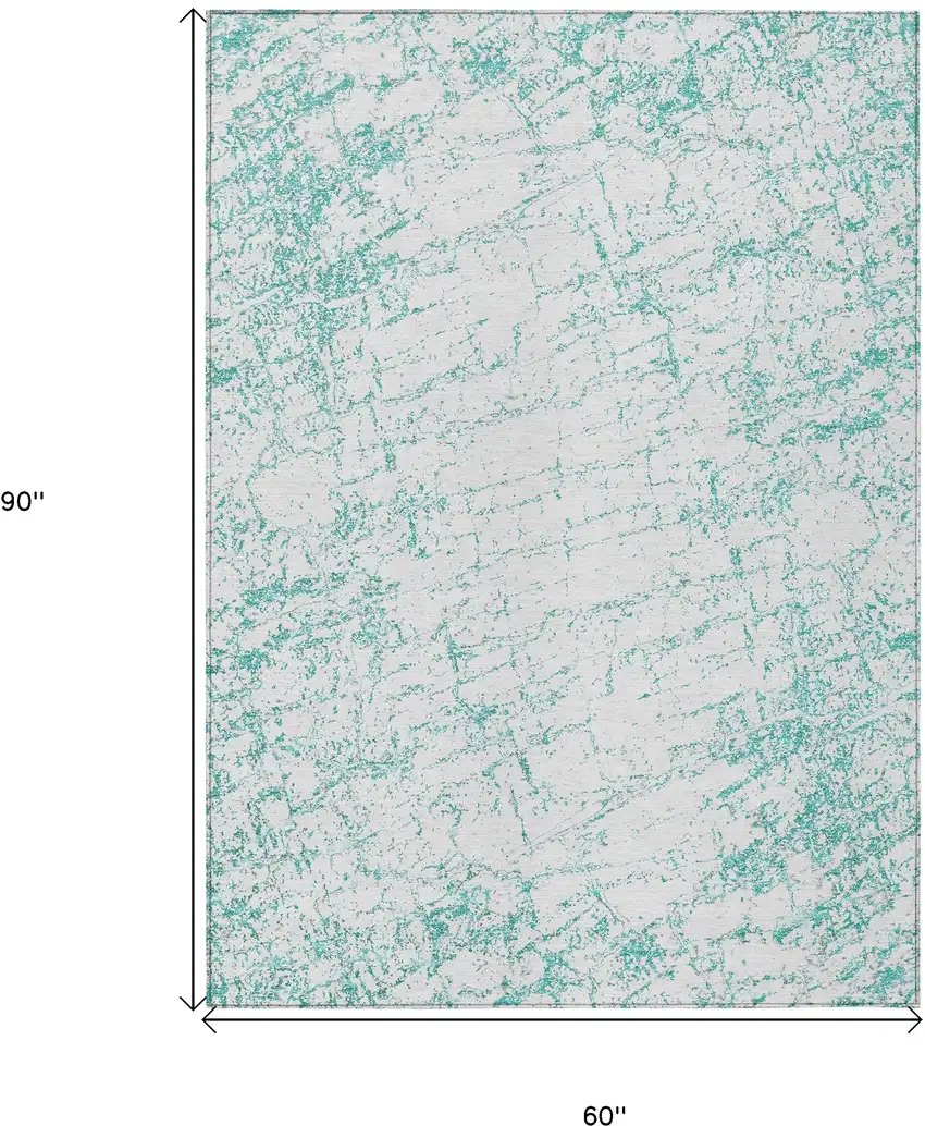 Teal Blue And Ivory Abstract Washable Indoor Outdoor Area Rug Photo 3