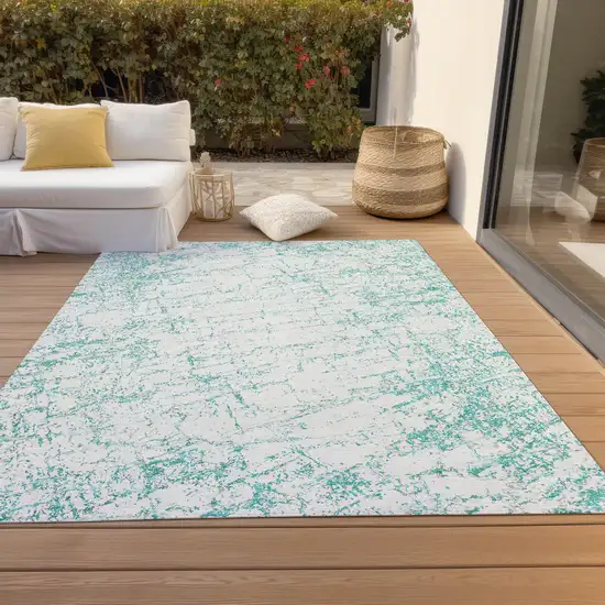Teal Blue And Ivory Abstract Washable Indoor Outdoor Area Rug Photo 6