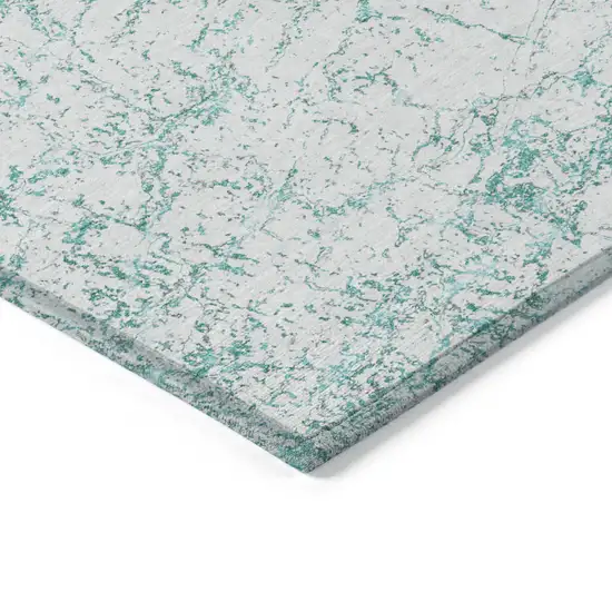 Teal Blue And Ivory Abstract Washable Indoor Outdoor Area Rug Photo 4
