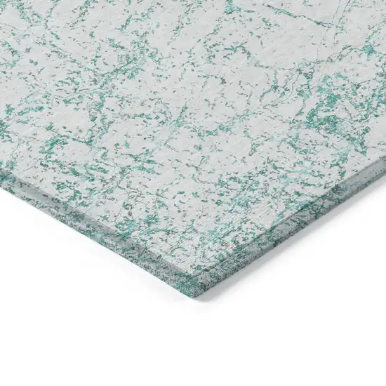 Teal Blue And Ivory Abstract Washable Indoor Outdoor Area Rug Photo 4
