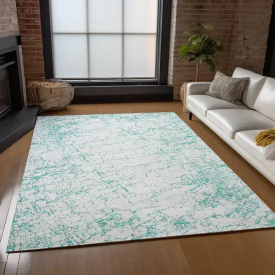 Teal Blue And Ivory Abstract Washable Indoor Outdoor Area Rug Photo 8